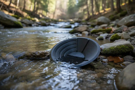 Beginner gold prospector panning for gold in a clear stream — Hobby Miner Outlet beginner's guide